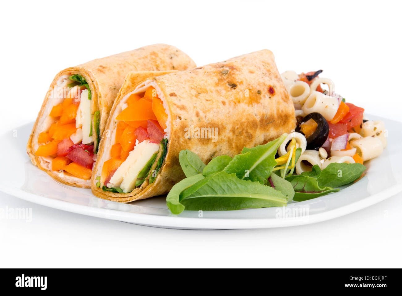 sandwich tortilla wrap closeup on plate over white background Stock Photo