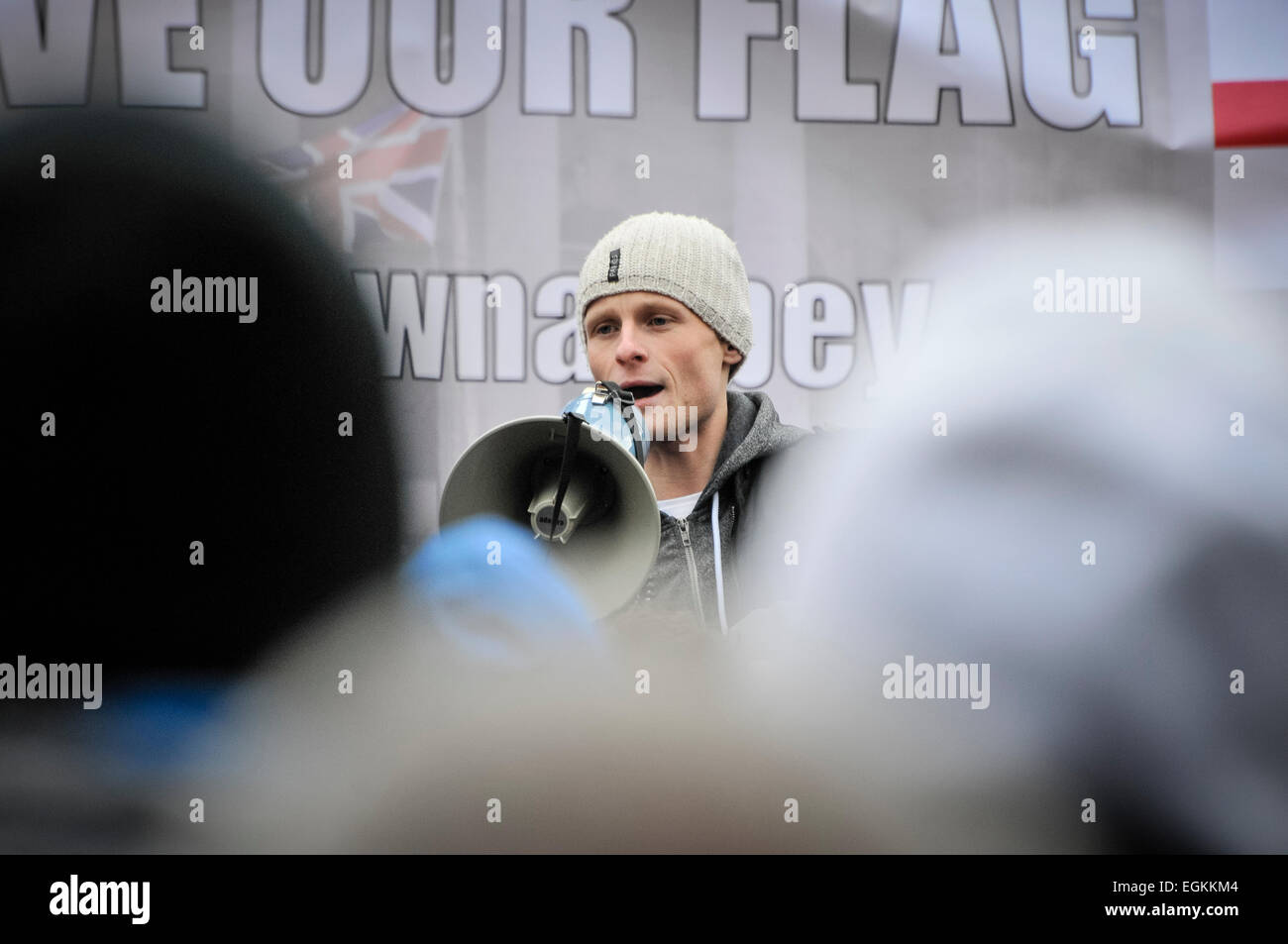 19th January 2013. Belfast, Northern Ireland - Jamie Bryson, chairman of hte Ulster People's Forum, addresses the crowd during the weekly protest at Belfast City Hall. Stock Photo