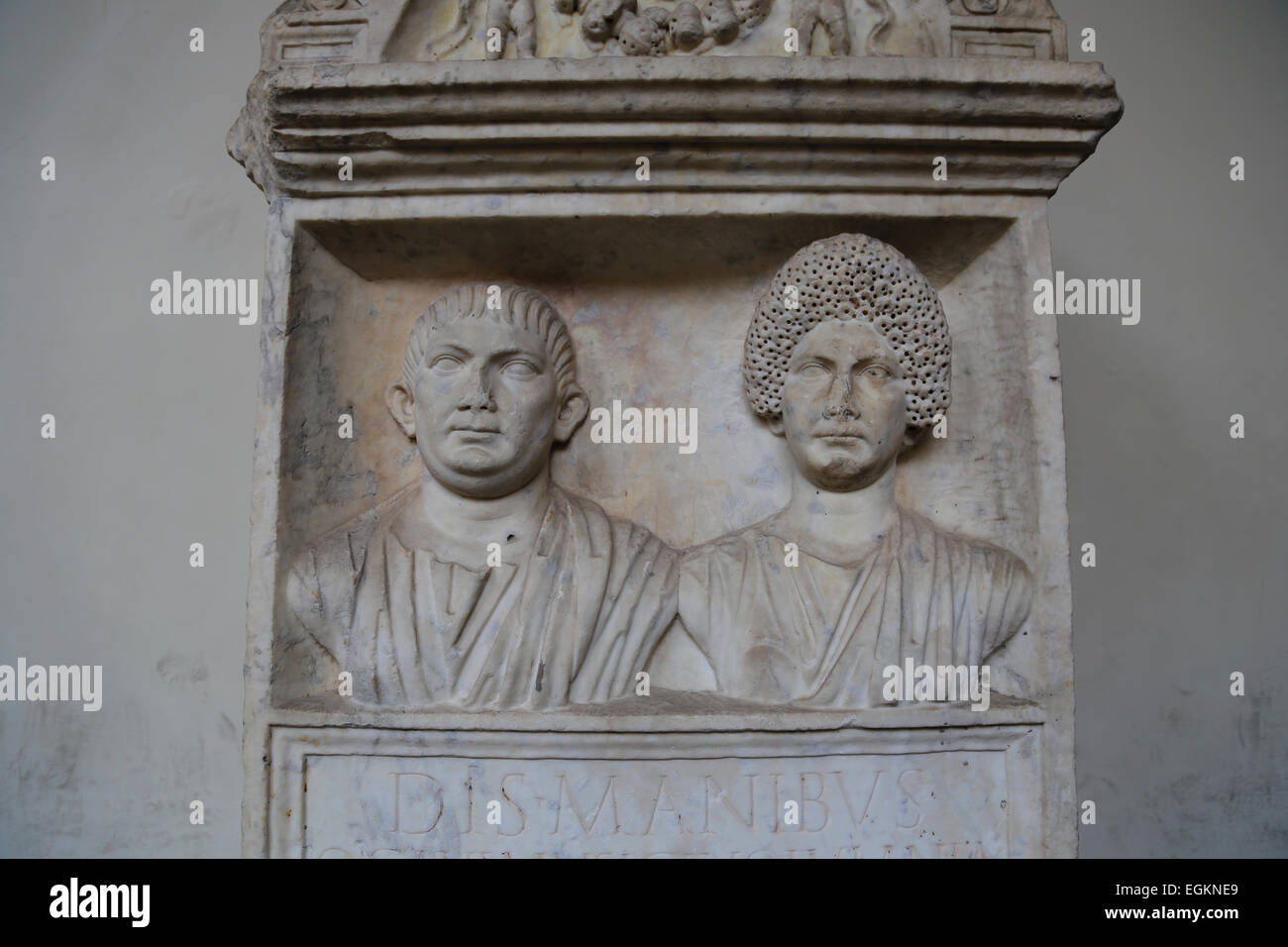 Roman tombstone. Marble. Relief. spouses portraits. Funerary inscription: Dis Manibus, spirits of the death (Manes). Stock Photo