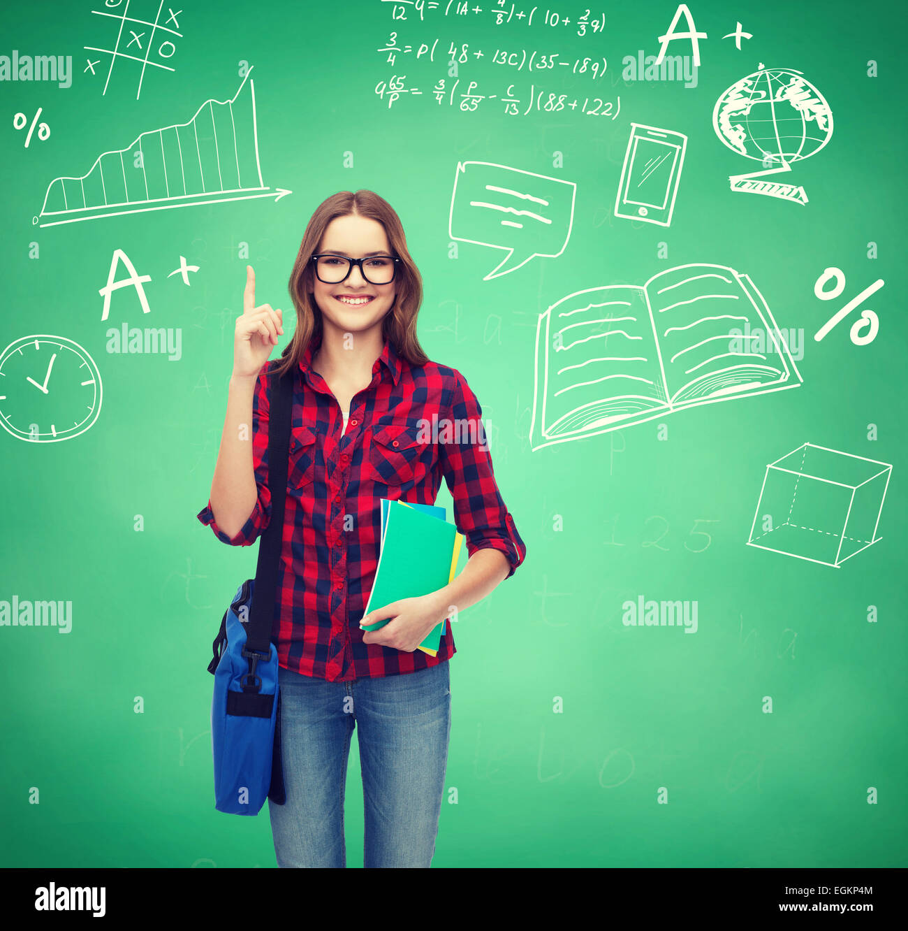 smiling student girl showing thumbs up Stock Photo - Alamy