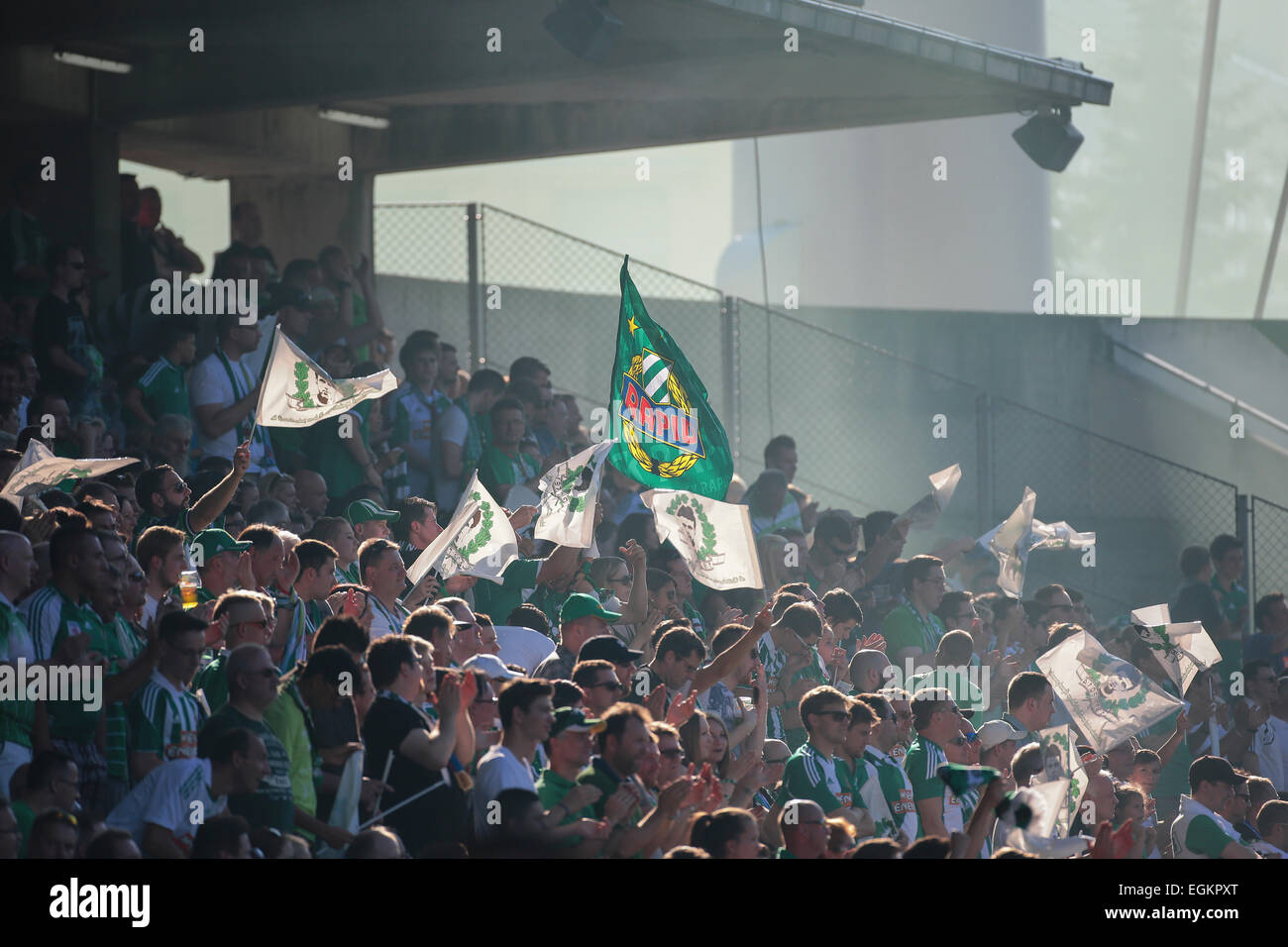 VIENNA, AUSTRIA - JULY 6, 2014: Fans of the SK Rapid celebrate the last game at Gerhard Hanappi Stadium before its demolition. Stock Photo