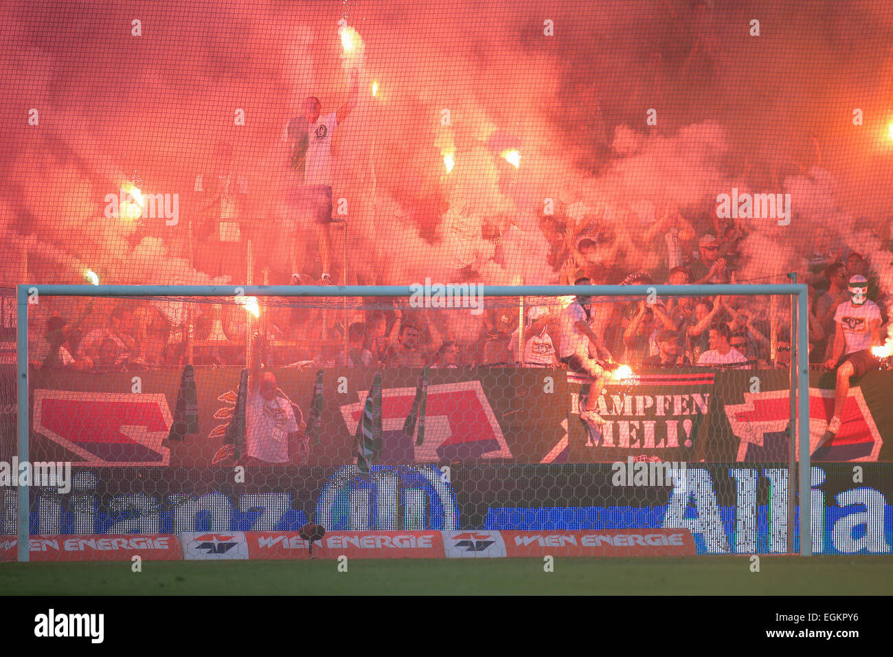 VIENNA, AUSTRIA - JULY 6, 2014: Fans of the SK Rapid celebrate the final at Gerhard Hanappi Stadium. Stock Photo