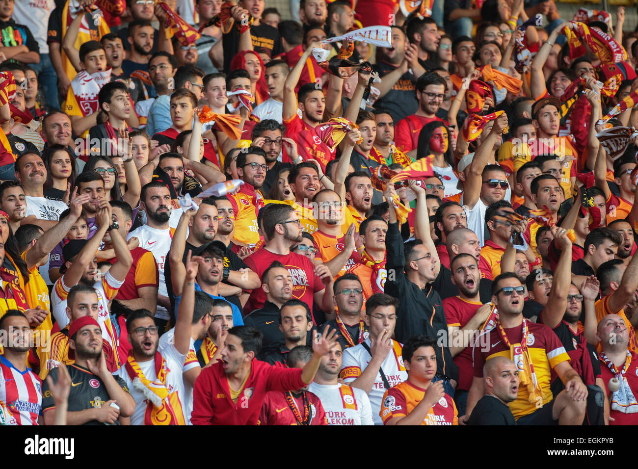 VIENNA, AUSTRIA - JULY 27, 2014: Fans of Galatasaray Istanbul cheer on their team during a friendly game against SK Rapid Vienna Stock Photo