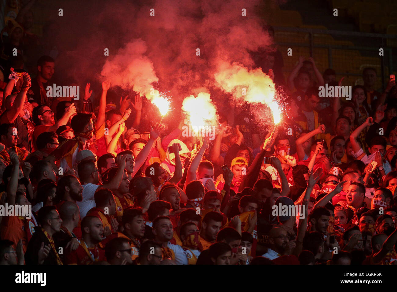 VIENNA, AUSTRIA - JULY 27, 2014: Fans of Galatasary Istanbul cheer on their team  during a friendly game. Stock Photo