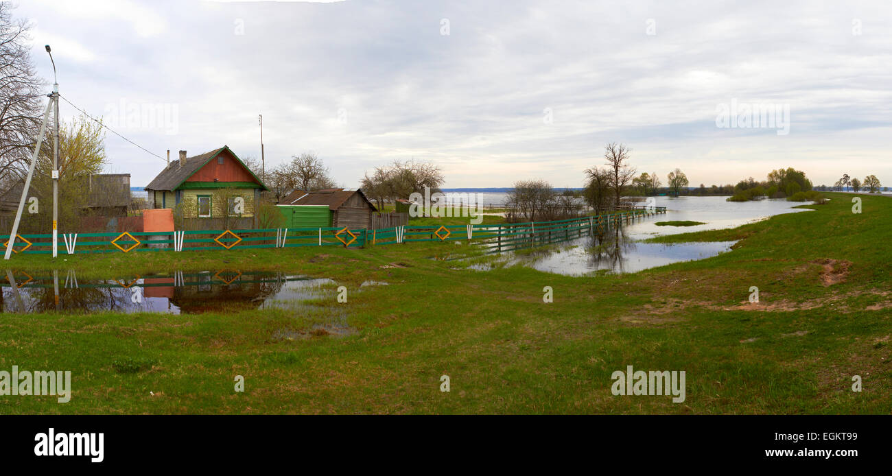 Spring panorama with the river in flood cloudy day Belarus Stock Photo