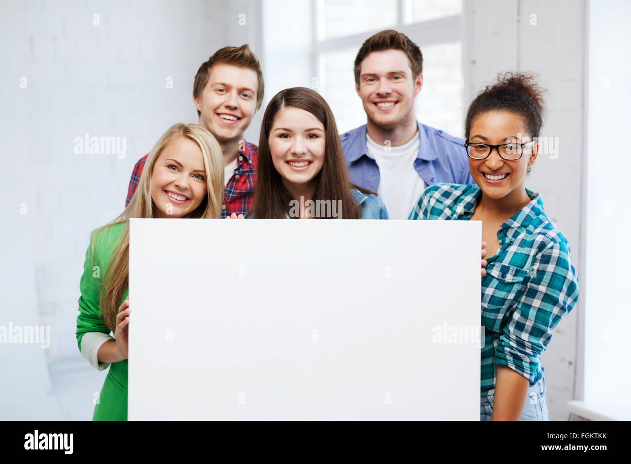 group of students at school with blank board Stock Photo - Alamy
