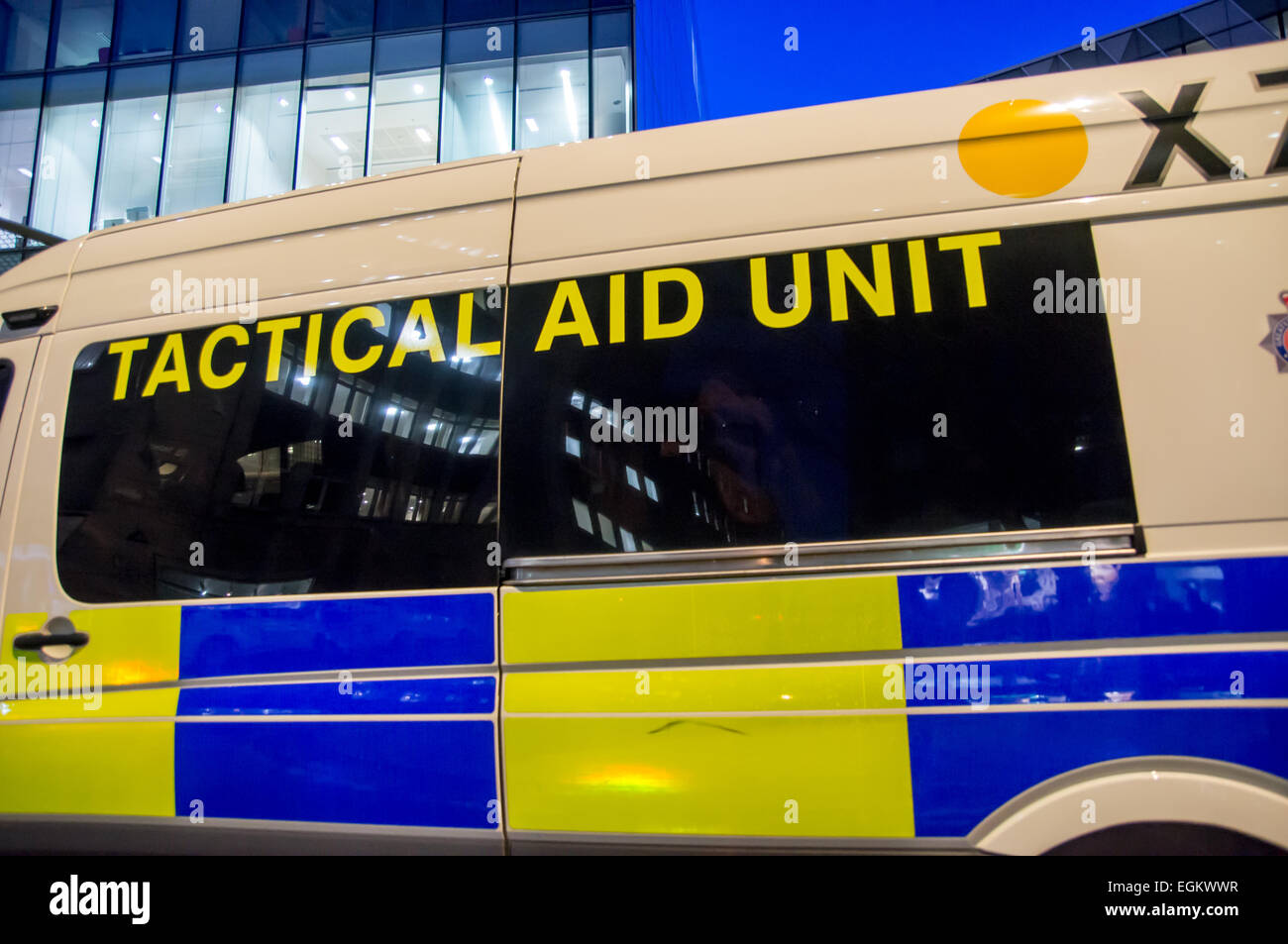 tactical aid police van patrolling streets of Manchester City Centre at night Stock Photo