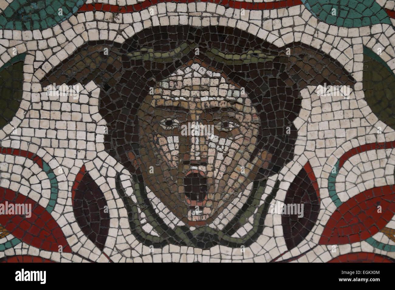 Roman art. Mosaic. Detail of Head of Medusa. Vatican Museums. Stock Photo