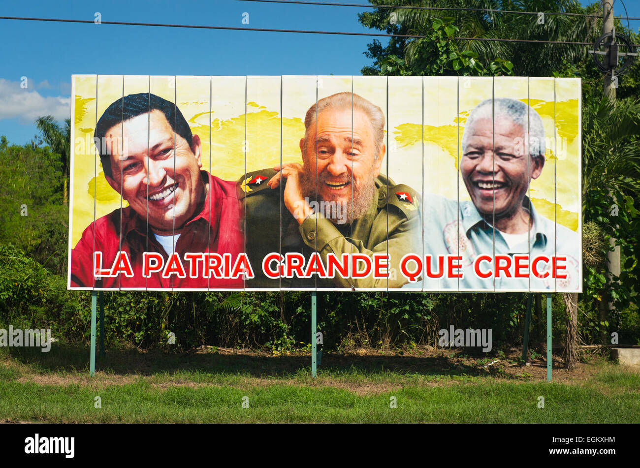Cuba Cienfuegos region political poster showing Hugo Chávez , Fidel Castro & Nelson Mandela La Patria Grande que Crece Stock Photo