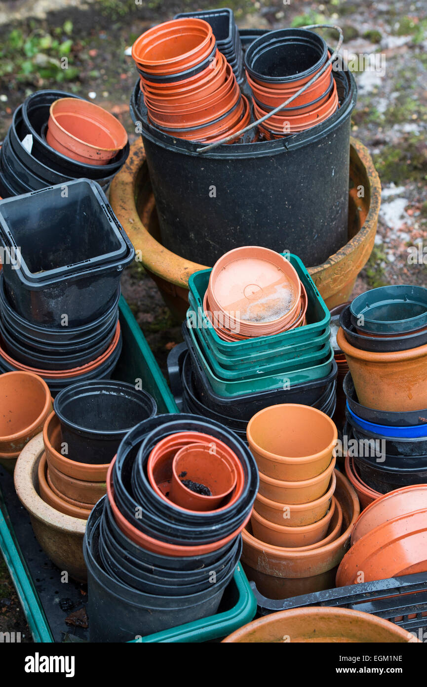 Assorted flower pots in a garden. UK Stock Photo Alamy