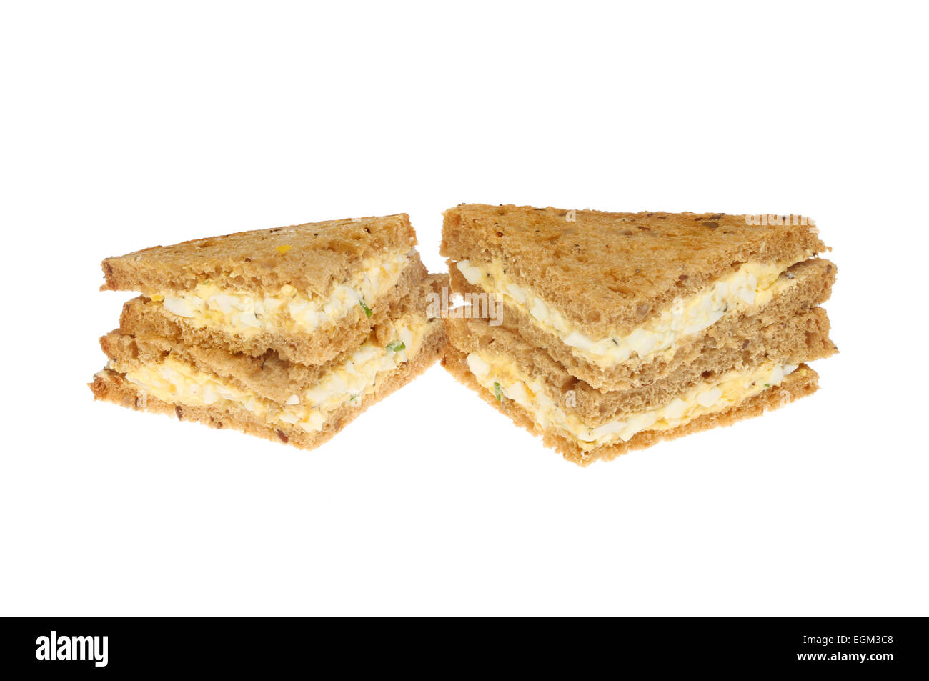 Egg mayonnaise sandwich on wholemeal bread isolated against white Stock Photo Alamy