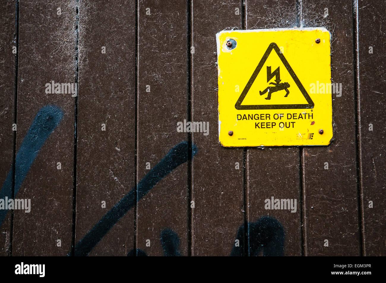 Sign on an electricity substation saying 'Danger of Death.  Keep Out' Stock Photo