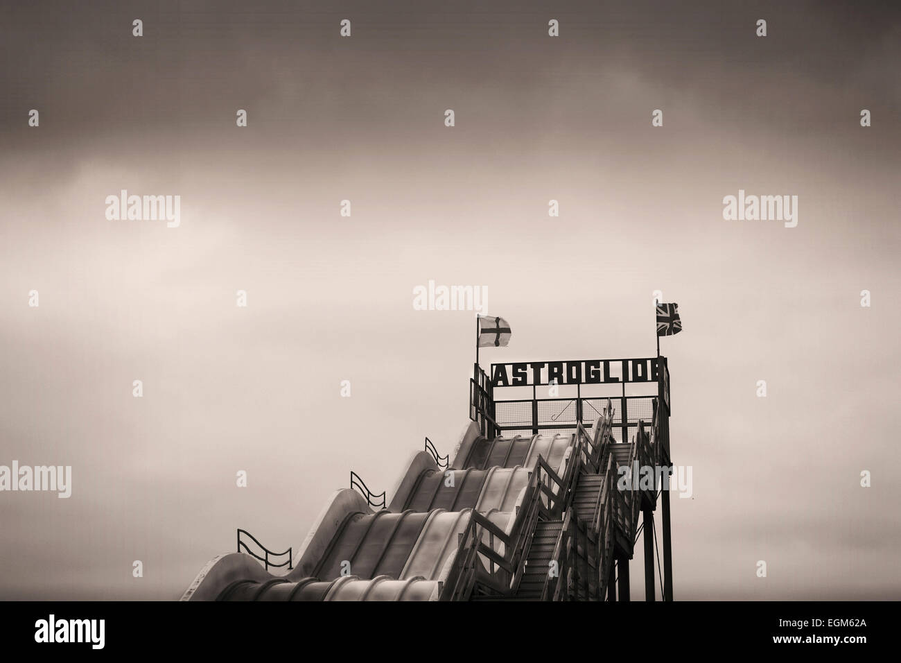 A disused Astroglide slide at an amusement park. Stock Photo