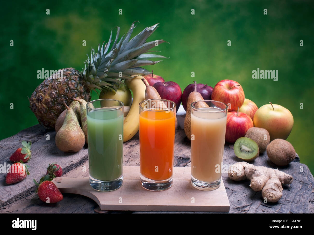 mixed fruit on a wooden board ready for juices and juice Stock Photo