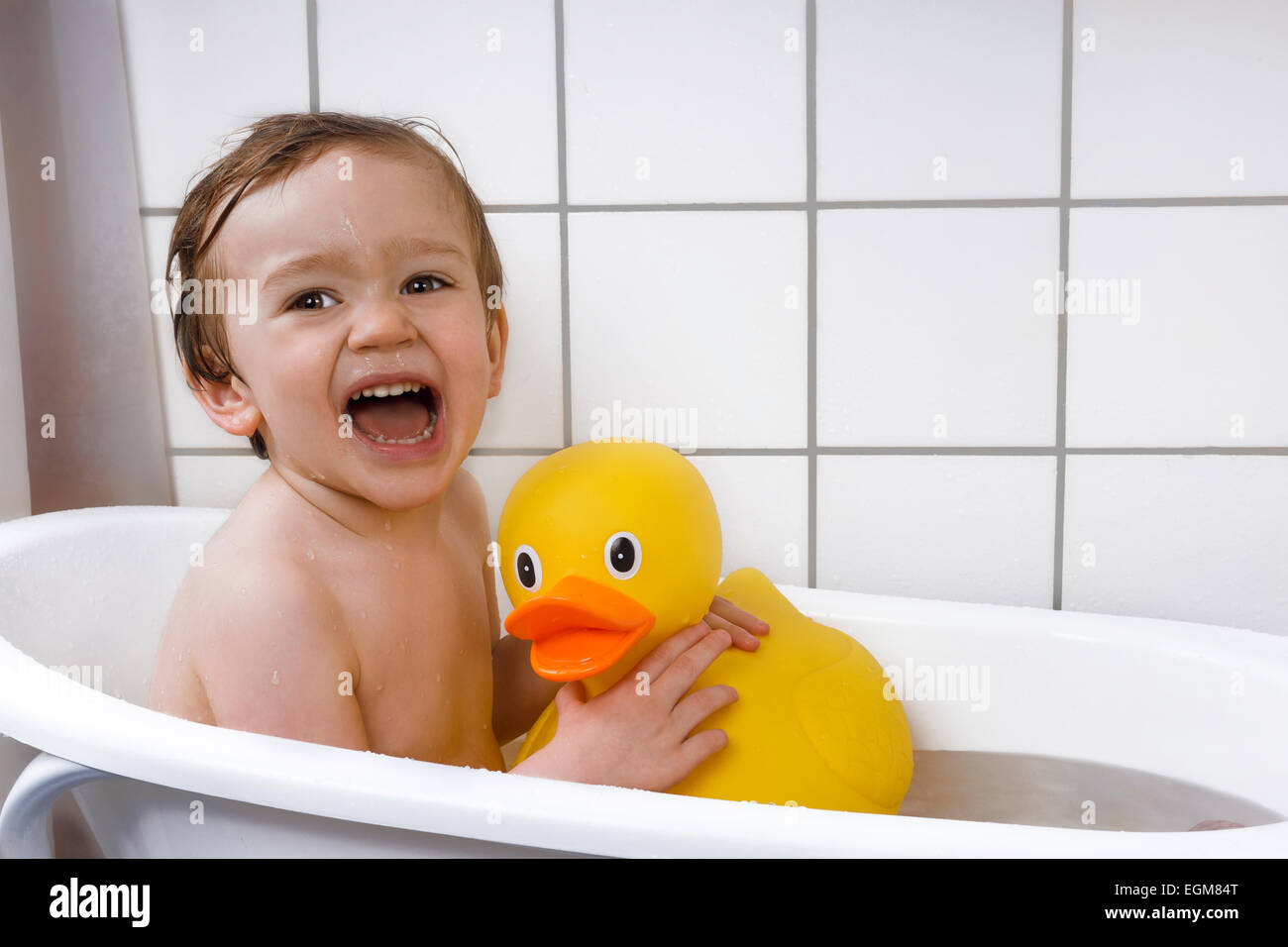 happy toddler taking a bath Stock Photo Alamy