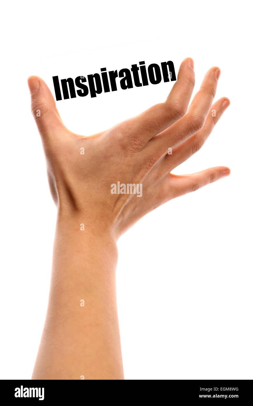 Vertical shot of a hand holding the word 'Inspiration' between two fingers, isolated on white. Stock Photo