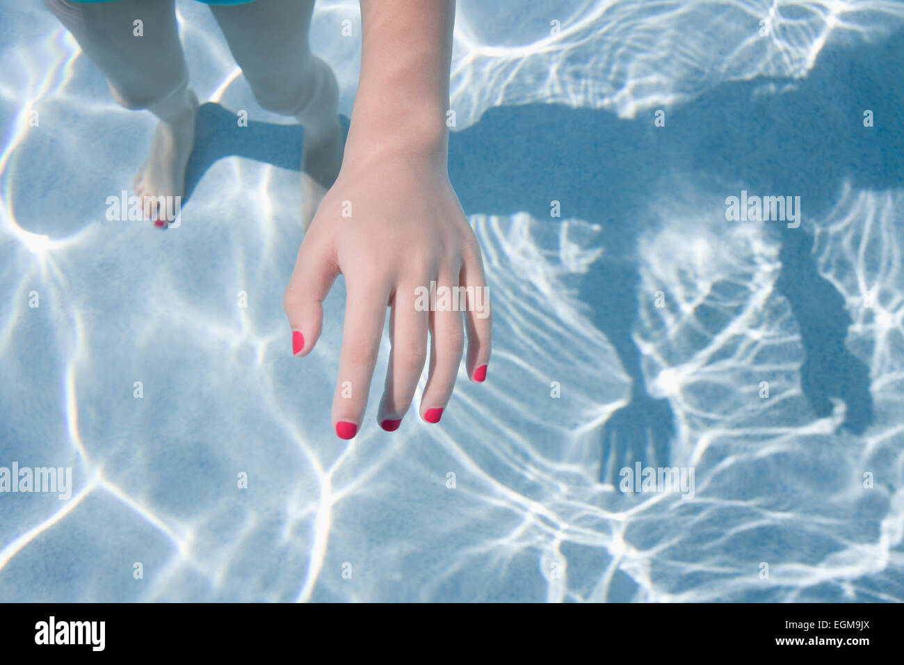 Child's Hand in Pool Water Stock Photo Alamy