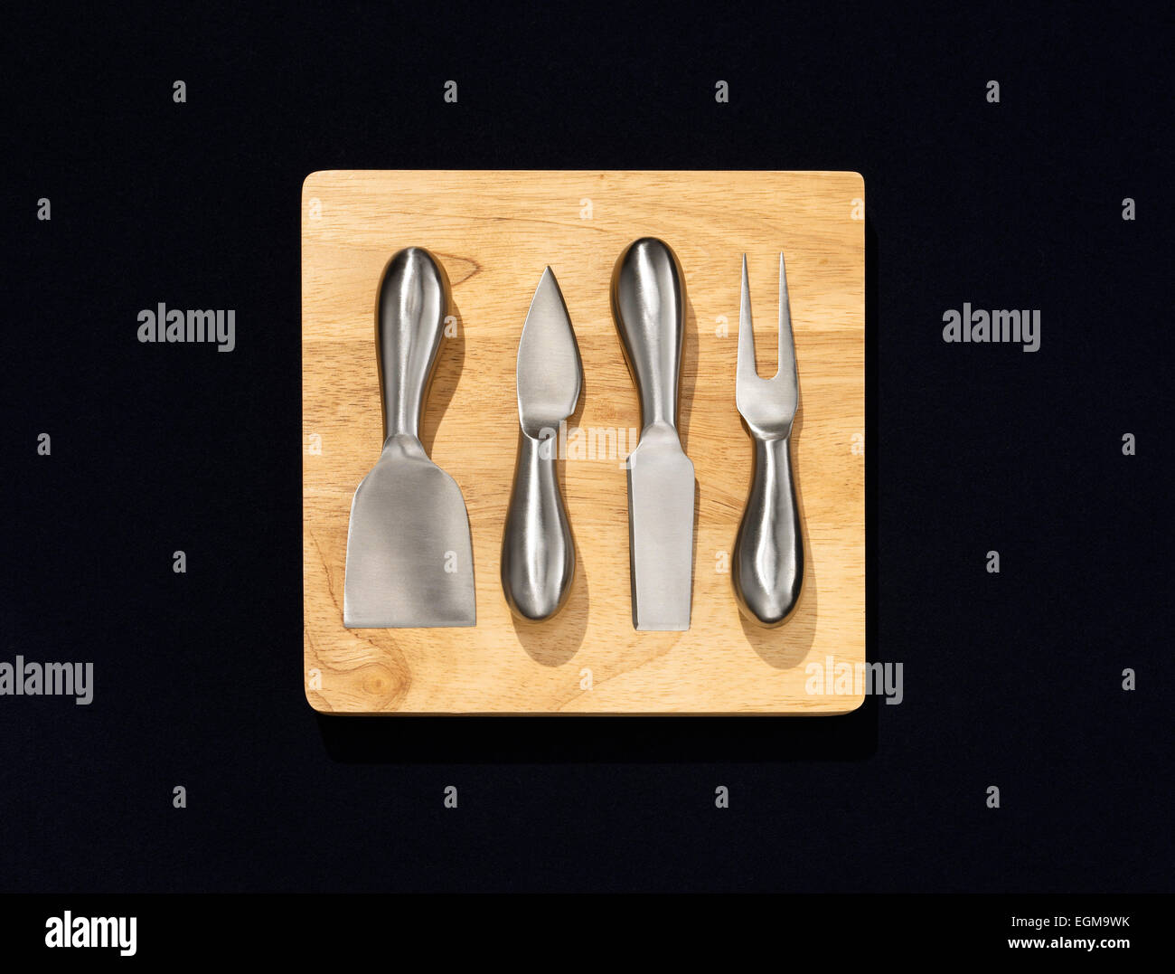 Cutting Board With Cheese Utensils Stock Photo Alamy