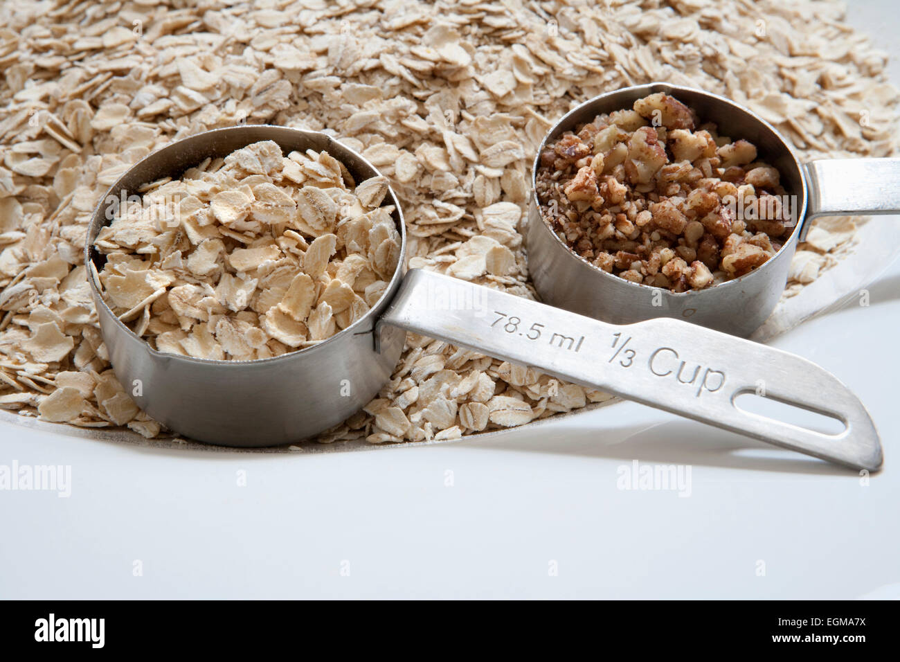 Oats and Nuts in Measuring Spoons Stock Photo Alamy