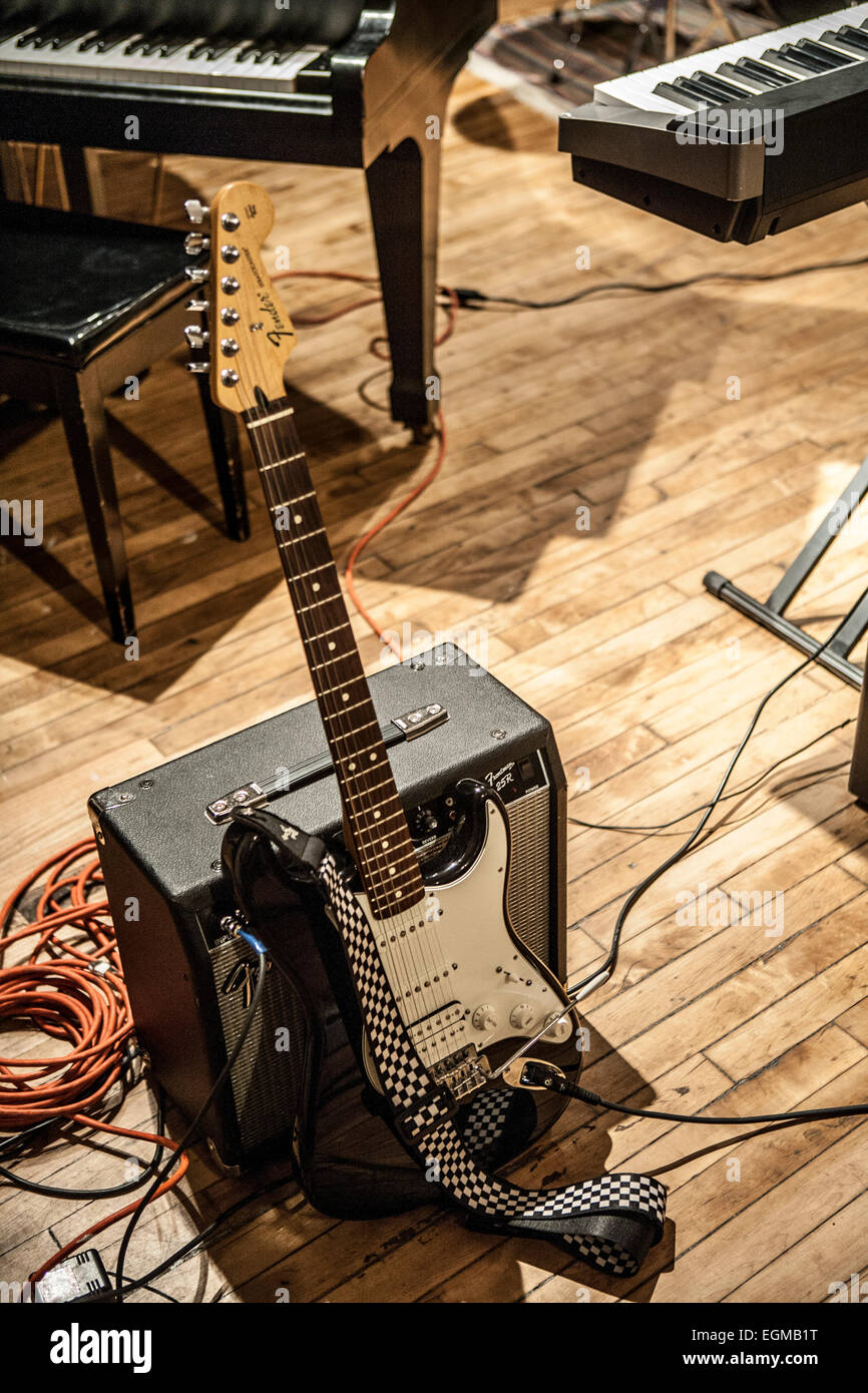 Electric Guitar with Amplifier on Stage Stock Photo