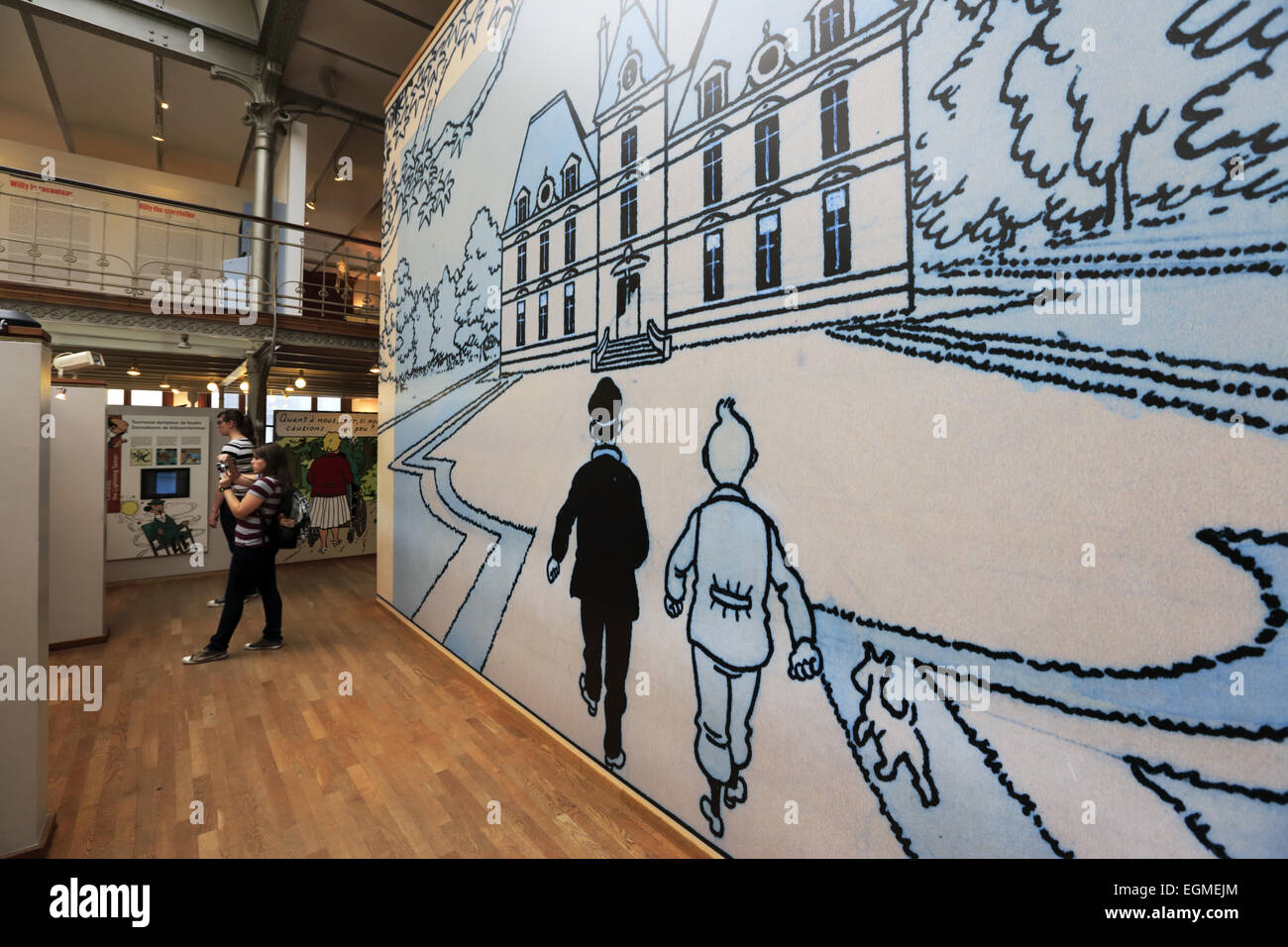 exhibition hall with a scene of Tintin and Captain Haddock on the wall inside of Belgian comic strip center, Brussels, Belgium Stock Photo