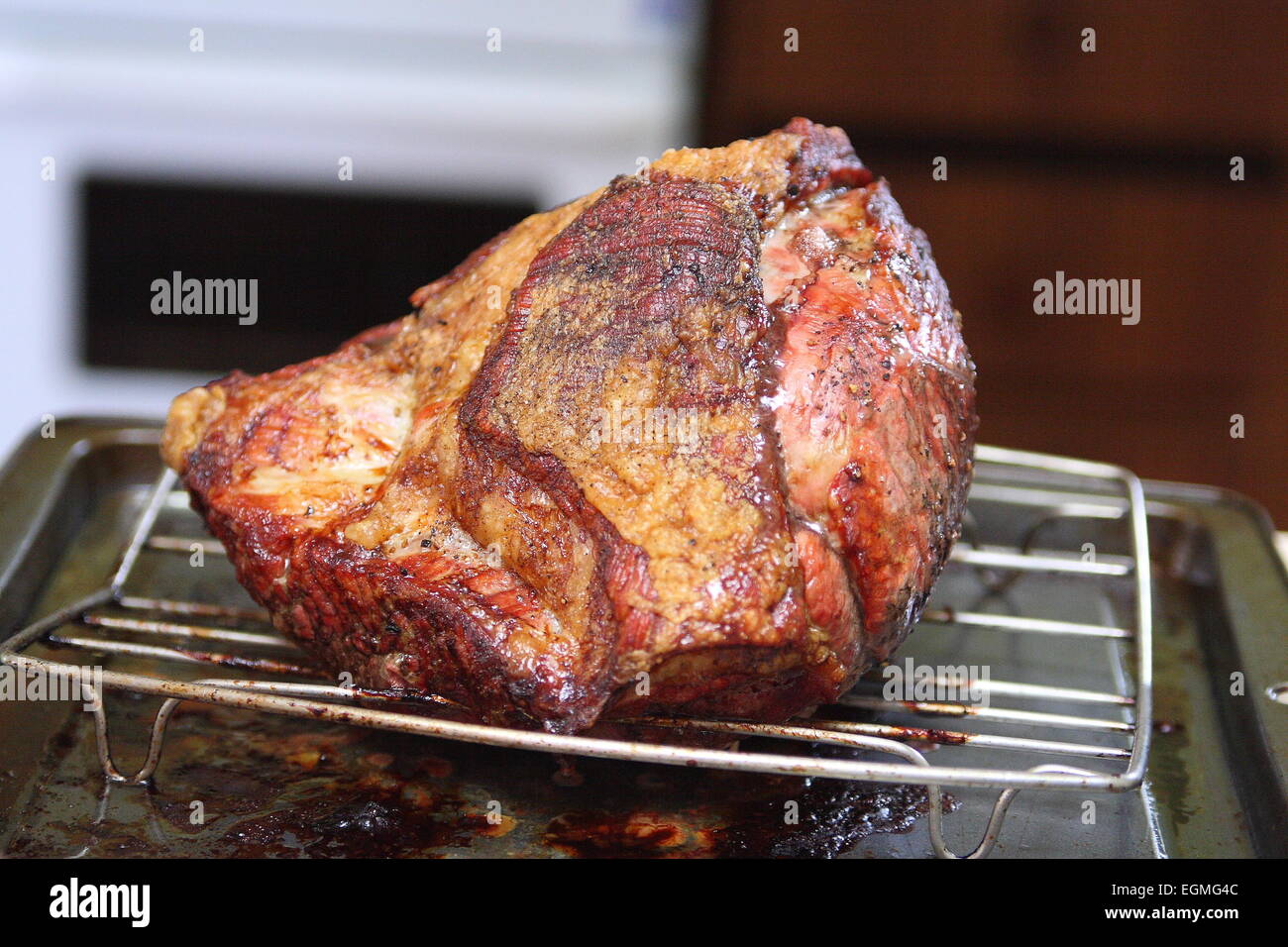 Roast Beef on roasting rack Stock Photo Alamy