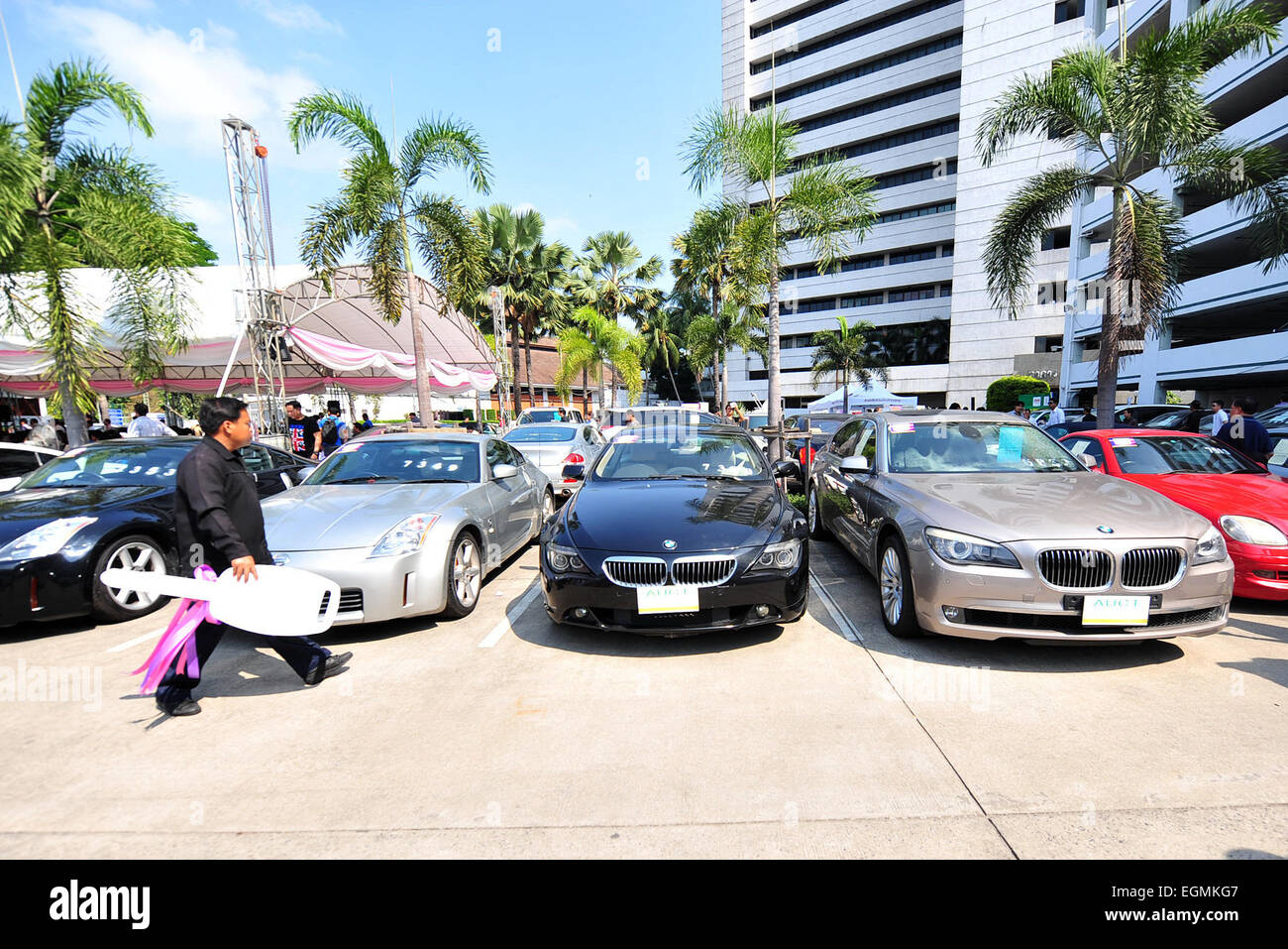 Bangkok, Thailand. 27th Feb, 2015. Thai people look at seized luxury cars during an auction at
