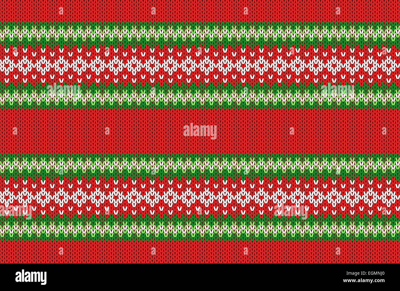 Winter Geometric Ornament Seamless Pattern Background in Red, Green and White from Knitted Fabric with Copy Space for Merry Christmas or Happy New Year Stock Photo