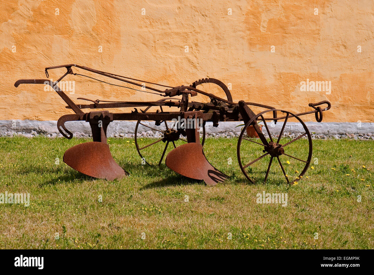 Old plow at a farm at Mols, Denmark Stock Photo Alamy