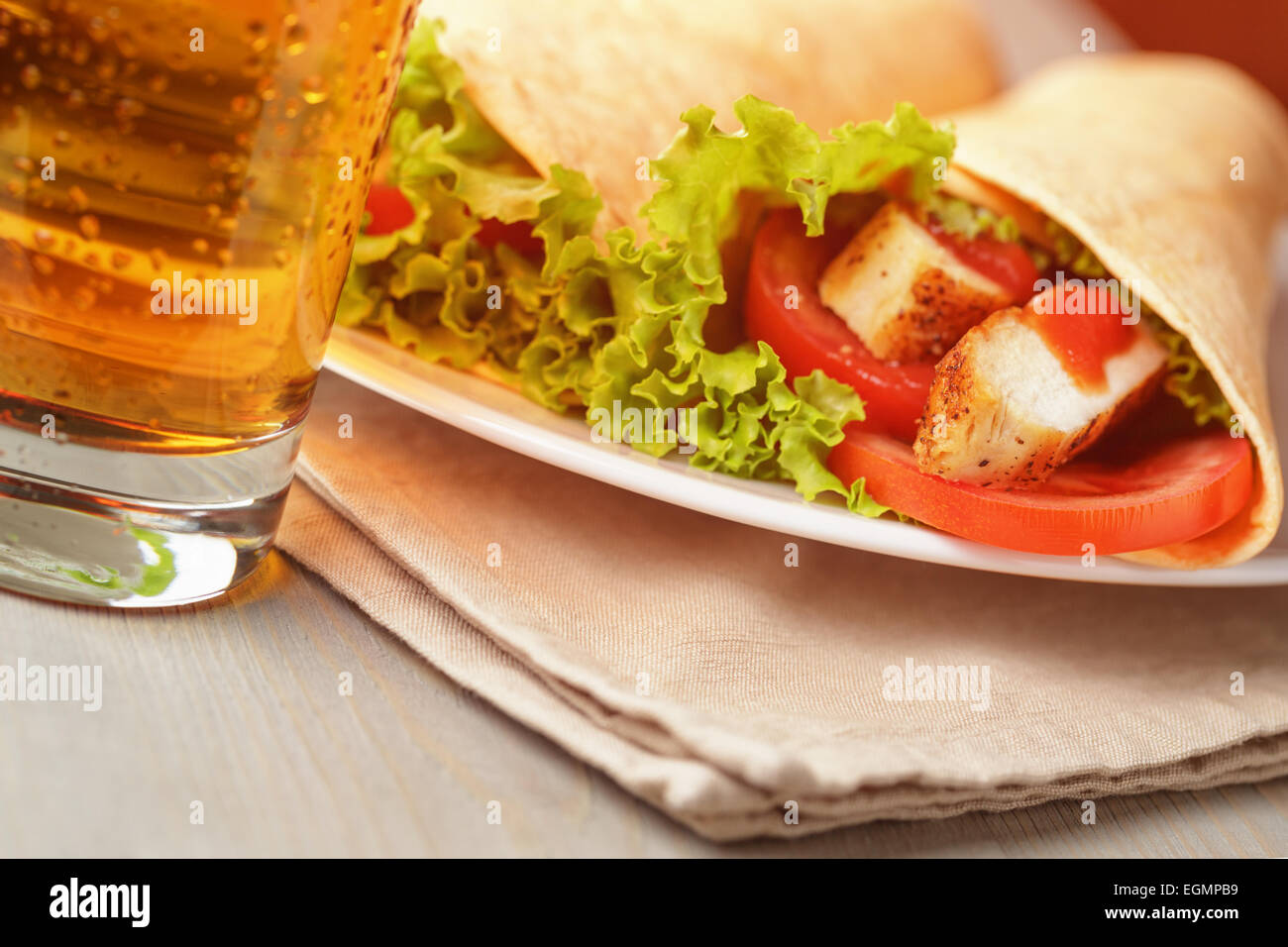 freshly made tortilla wraps with chicken and vegetables Stock Photo