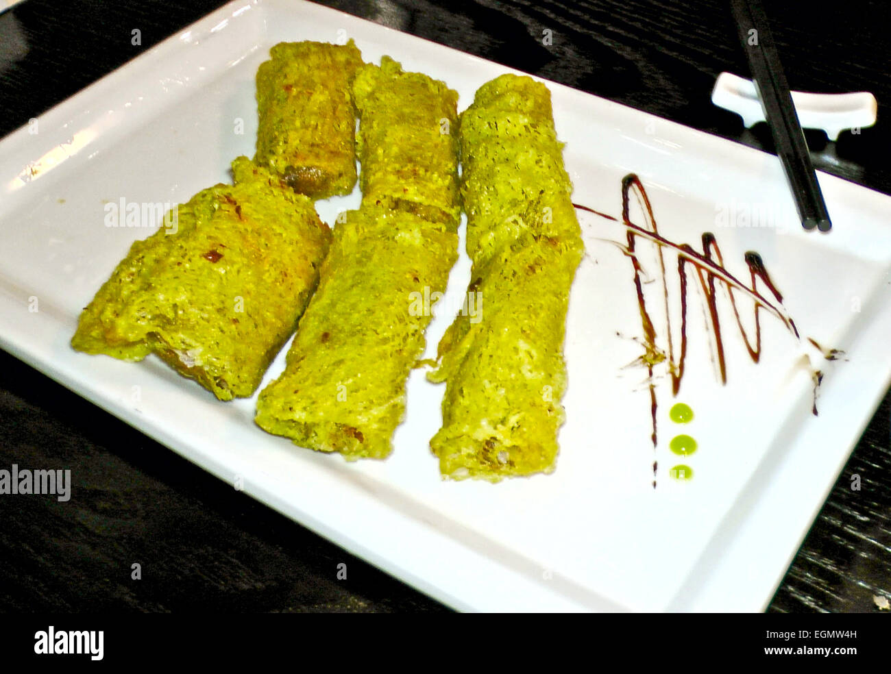 Japanese national dish - roll fresh fish wrapped in seaweed. Stock Photo