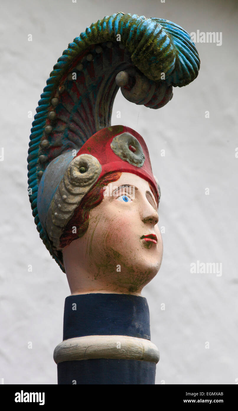 On top of a vintage petrol pump is this ornate boy's head, Portmeirion, Wales, Europe Stock Photo