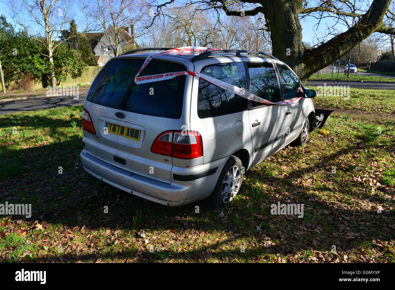 A crashed Ford Galaxy on a roundabout in Horley. Stock Photo
