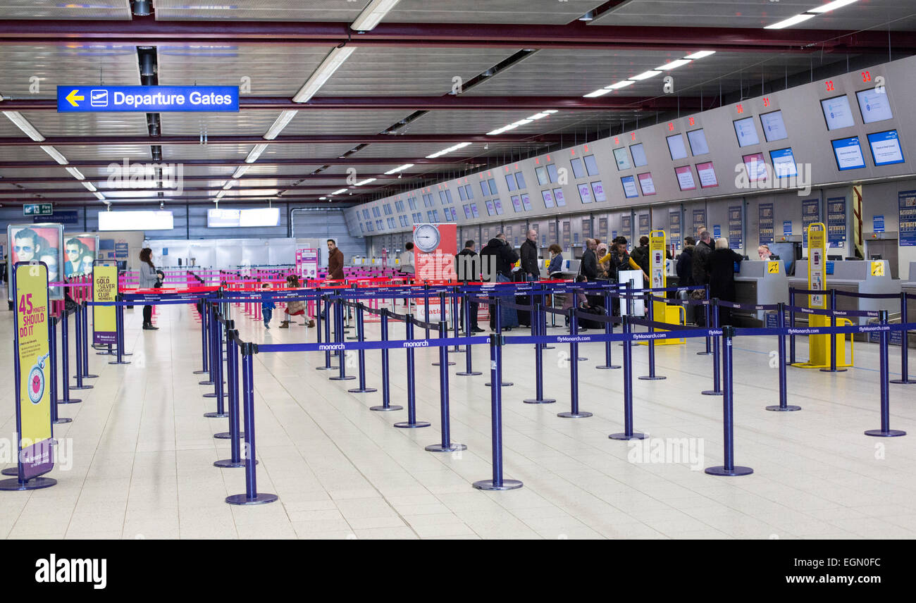 Luton airport checkin check in desks empty queues Stock Photo