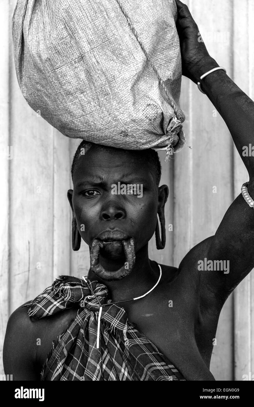 Portrait Of A Woman From The Mursi Tribe, Jinka Town, Omo Valley, Ethiopia Stock Photo