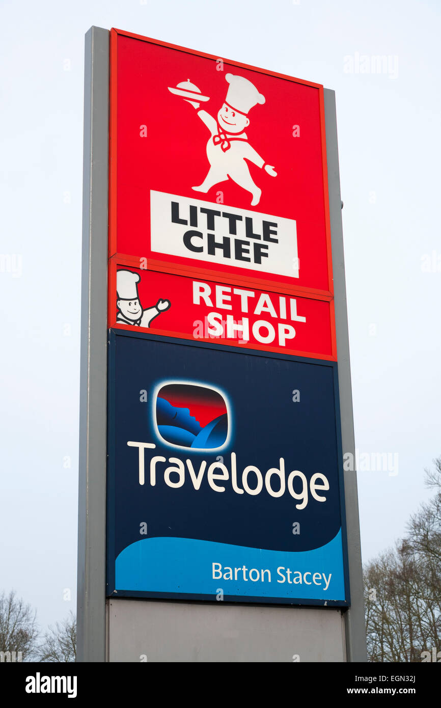 Sign outside joint Little Chef fast food roadside restaurant / diner, & a Travelodge hotel which share a site. Barton Stacey UK Stock Photo