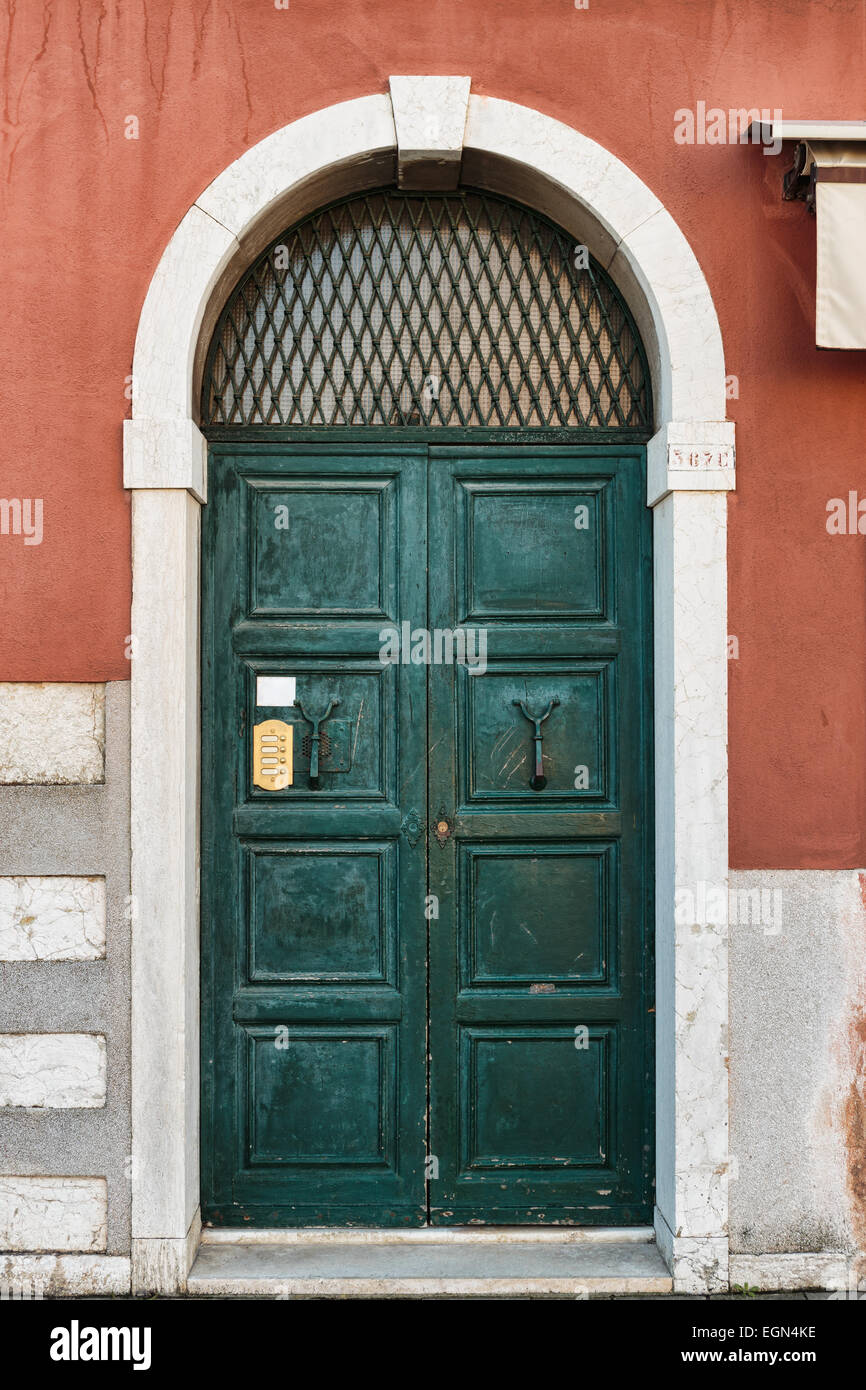 Old wooden door in a stone house Italian Stock Photo - Alamy