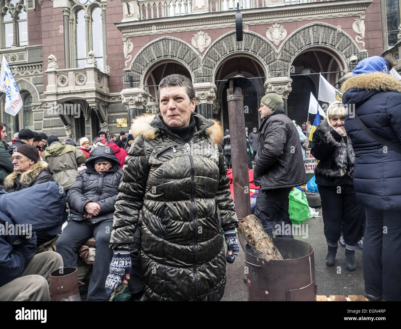 Feb. 27, 2015 - Activists ''Financial Maidan'' is located at the National Bank of Ukraine for a long time. -- Activists ''Financial Maidan'' continue to picket the National Bank of Ukraine on Friday, February 27, 2015 in Kiev. In the morning, a few dozen activists joined the people who were under the walls of the bank, after the evening breaking up the meeting by police. People insist on their demands - review of foreign currency loans. (Credit Image: © Igor Golovniov/ZUMA Wire) Stock Photo