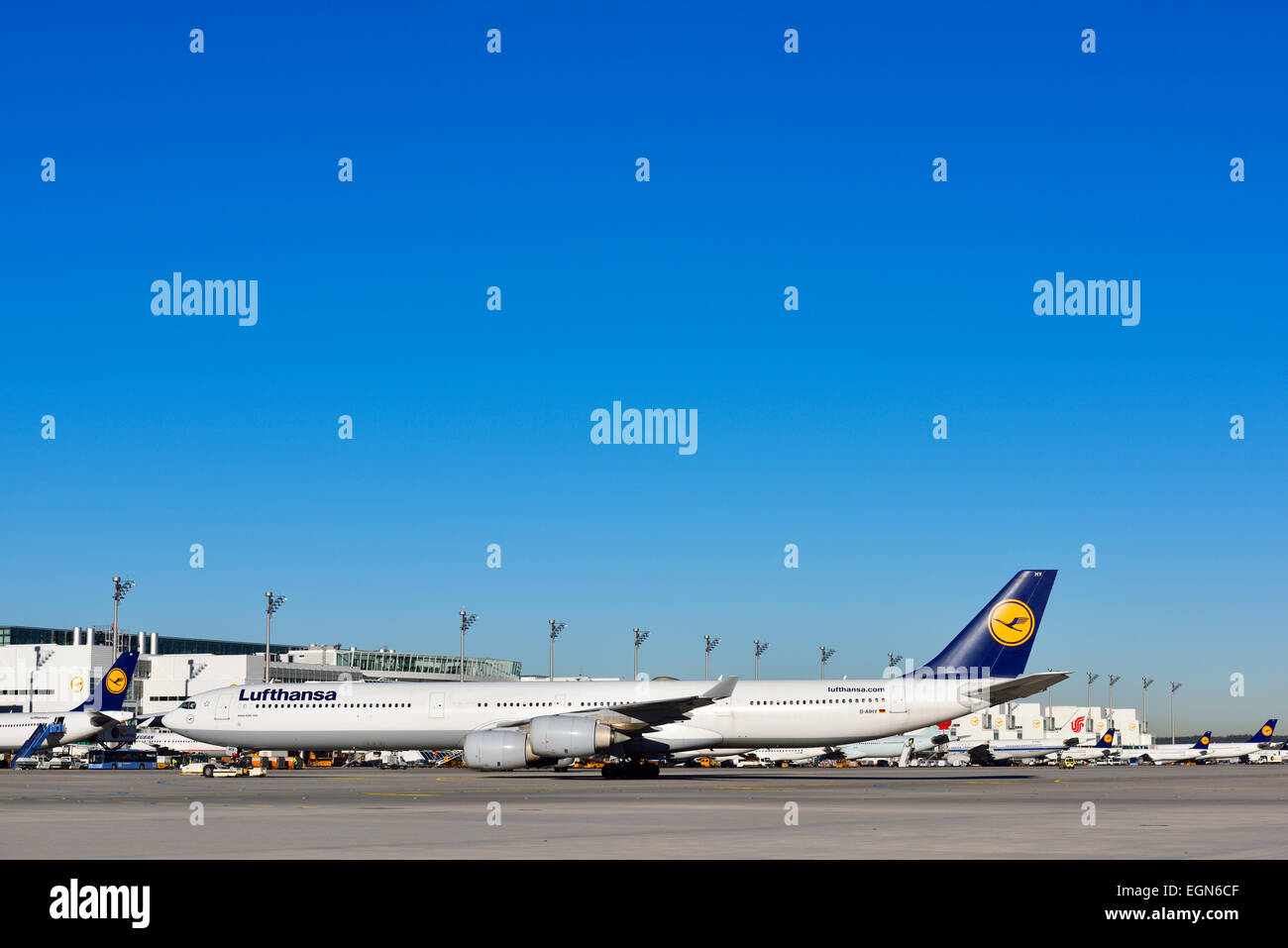 lufthansa, airbus, a 340-600, push back truck, terminal 2, tower, muc, airport, roll out, taxiway, Stock Photo