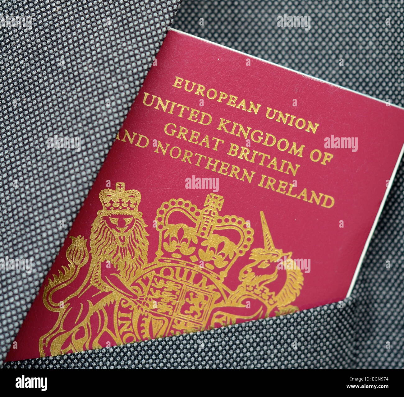 A UK Passport In A Suit Pocket Stock Photo