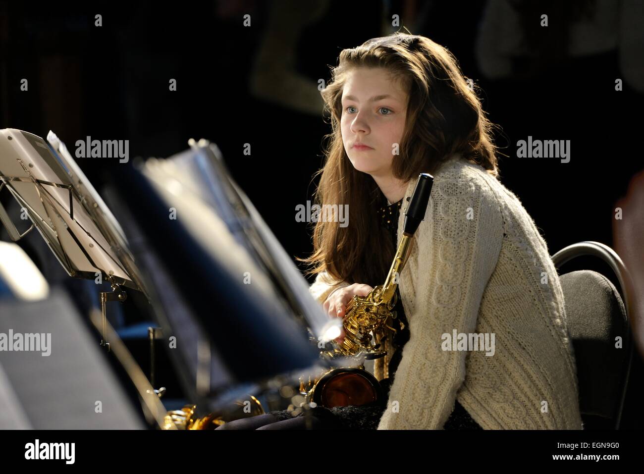 Riga Latvia. Members of youth orchestra during classical music recital inside Saint Peters Church Stock Photo