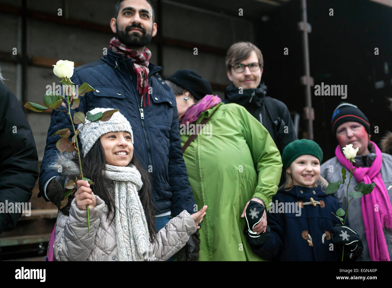 Copenhagen, Denmark. 27th February, 2015. Kids of all races and religions standing side by side holding white roses in this late Friday afternoon rally against hate crimes in Copenhagen. Credit:  OJPHOTOS/Alamy Live News Stock Photo
