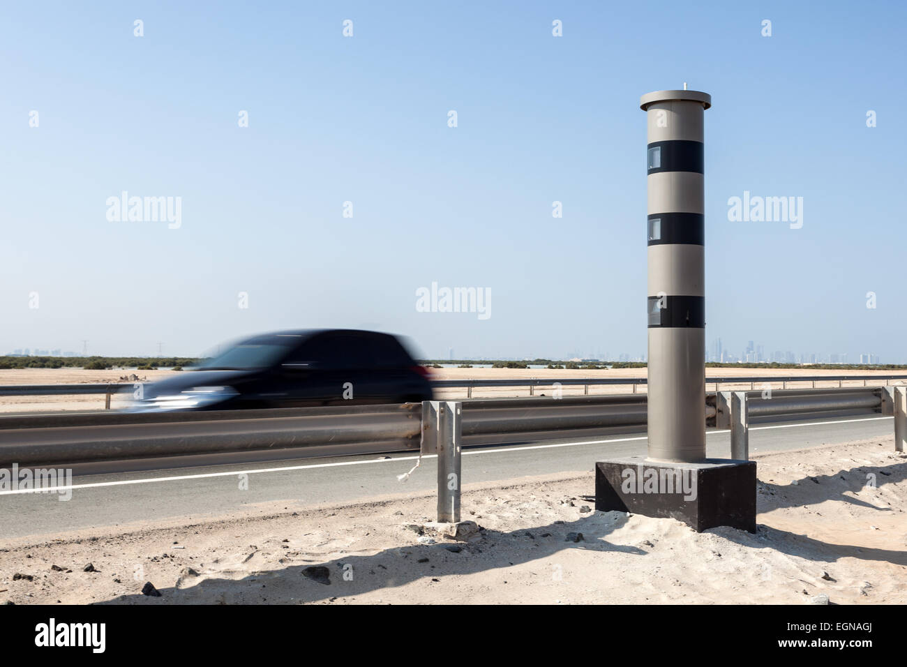 Radar speed control camera at the highway in Abu Dhabi, United Arab  Emirates Stock Photo - Alamy