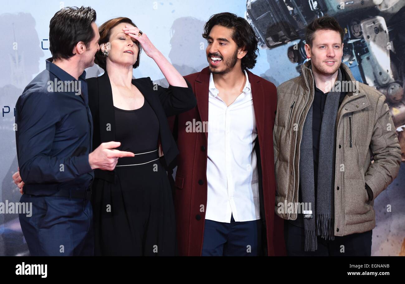 Berlin, Germany. 27th Feb, 2015. Australian actor Hugh Jackman (l-r), US actress Sigourney Weaver, British actor Dev Patel and South African director Neill Blomkamp attend the fan event for their new film 'Chappie' in Berlin, Germany, 27 February 2015. The film starts in German cinemas on 5 March 2015. Photo: Britta Pedersen/dpa/Alamy Live News Stock Photo