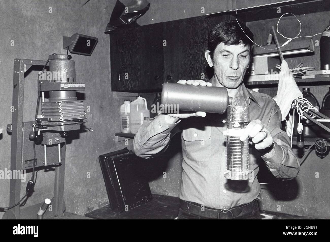 File. 27th Feb, 2015. LEONARD NIMOY, the actor who won a global following as Mr. Spock, the alien first officer of the Starship Enterprise in the television and movie series 'Star Trek, ' died on Friday morning at his home in the Bel Air, Los Angeles. He was 83. His wife, Susan Bay Nimoy, confirmed his death, saying the cause was end-stage chronic obstructive pulmonary disease. Pictured - Leonard Nimoy c. 1980's - Los Angeles, California, U.S. - Working in photo lab producing photos he captured. © Globe Photos/ZUMAPRESS.com/Alamy Live News Stock Photo