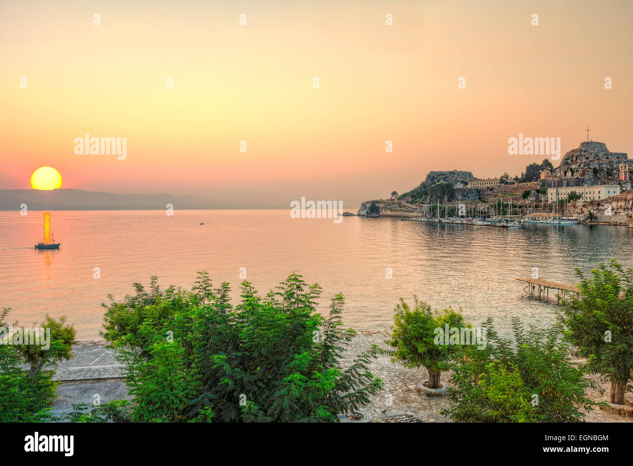 Sunrise at the sailing club in old fortress of Corfu, Greece Stock Photo