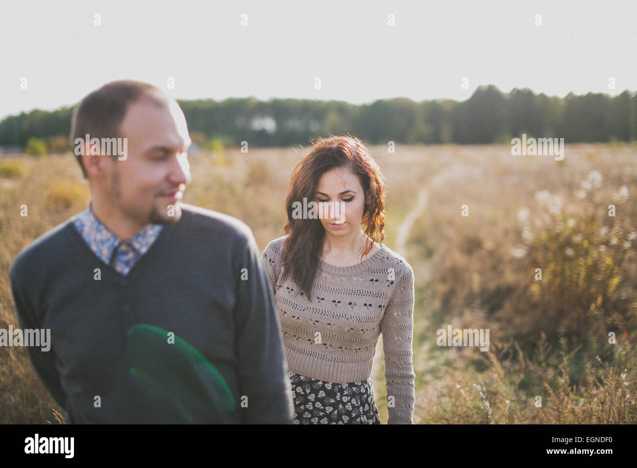 Image of a young couple enjoying their time together at autumn sunset Stock Photo
