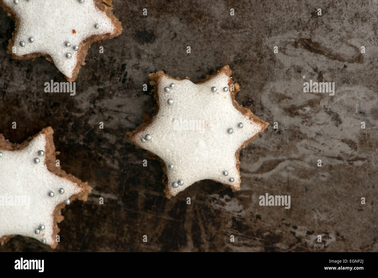 Cinnamon stars on a baking tray Stock Photo