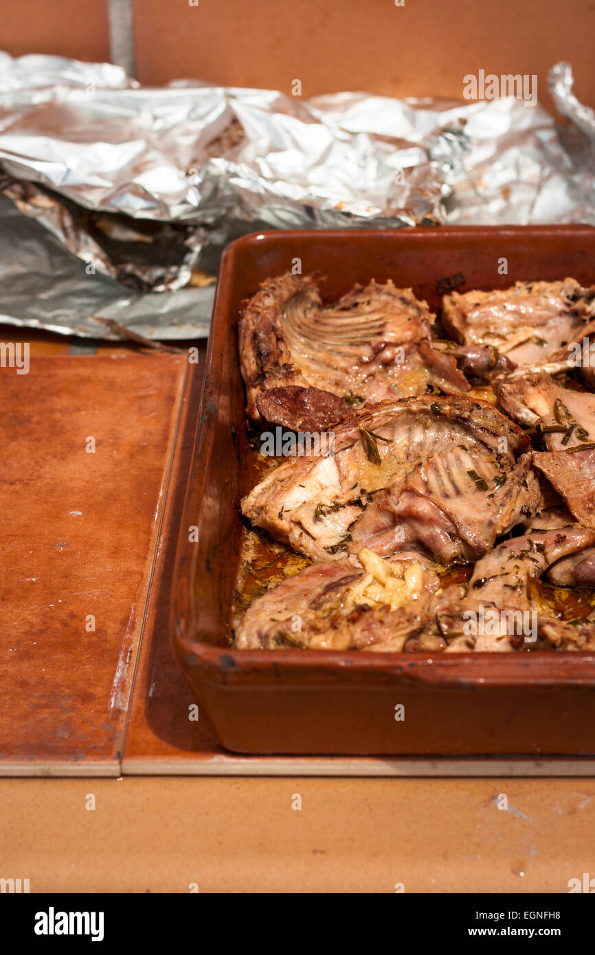 Roasted traditional Mediterranean rabbit. Stock Photo