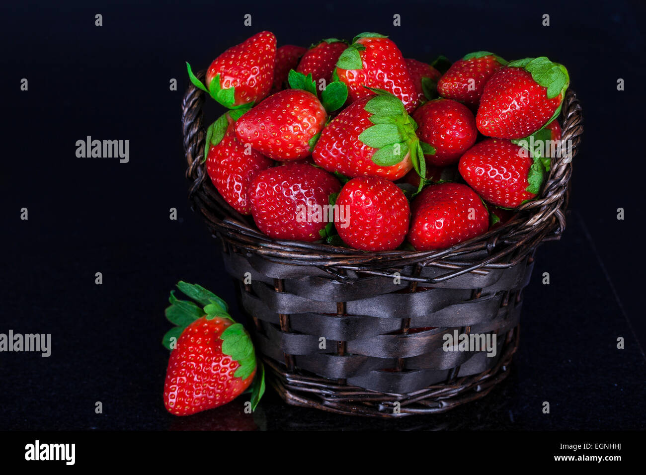 Group of people eating strawberries hi-res stock photography and images ...
